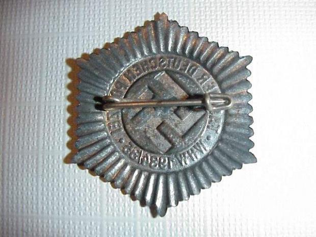 Police day pin 1934-35 back.JPG