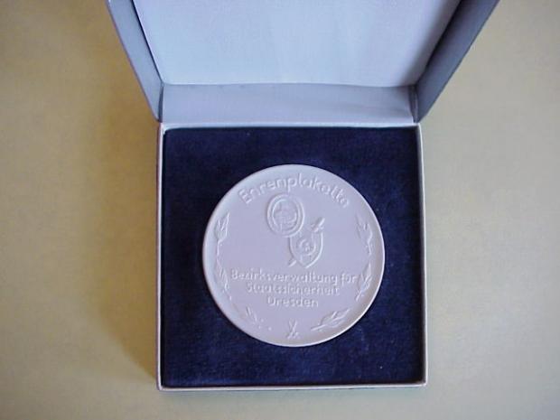 DDR Stasi medal in case.JPG