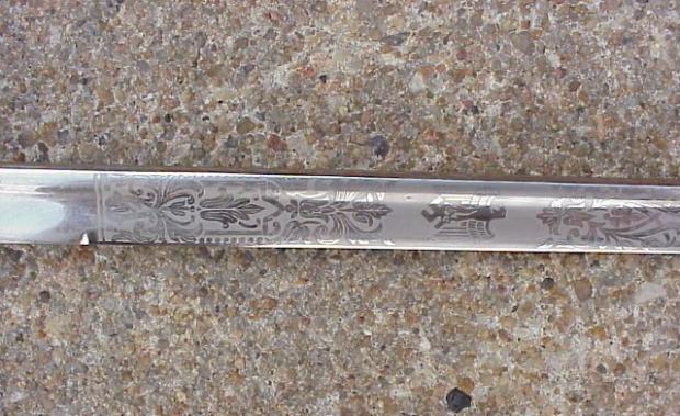 Dove hilt etched blade.JPG