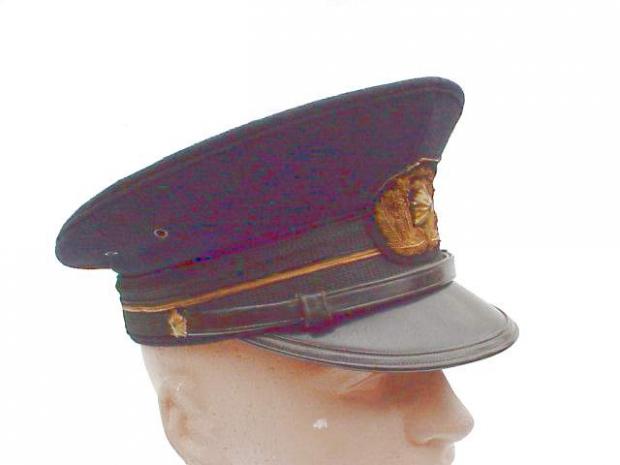 Japanese Police Inspector peaked cap side.JPG